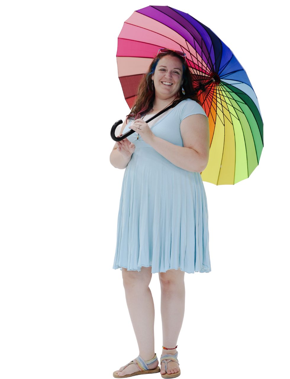 Colette Dalton holding a rainbow umbrella